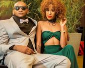 A photo of Colonel Mustafa and Noti Flow during happier times