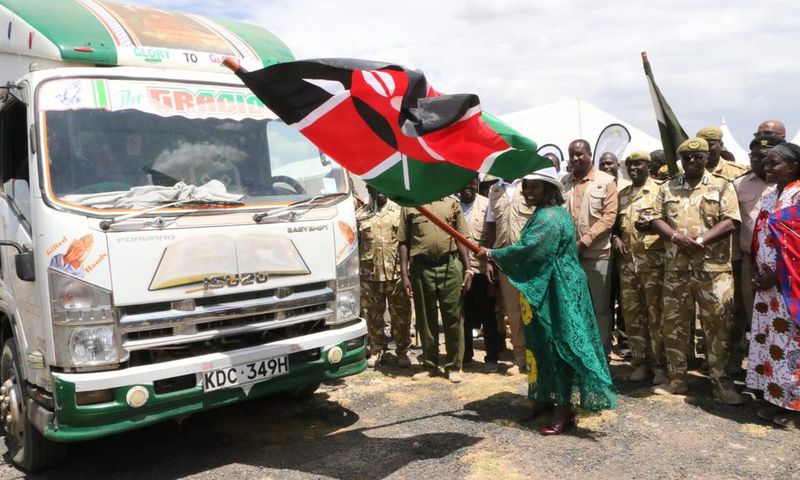 CS for tourism Wildlife and Heritage Peninah Malonza flagging off stacks of hay that will be distributed to wildlife in the Amboseli Park