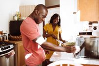 A person using a microwave