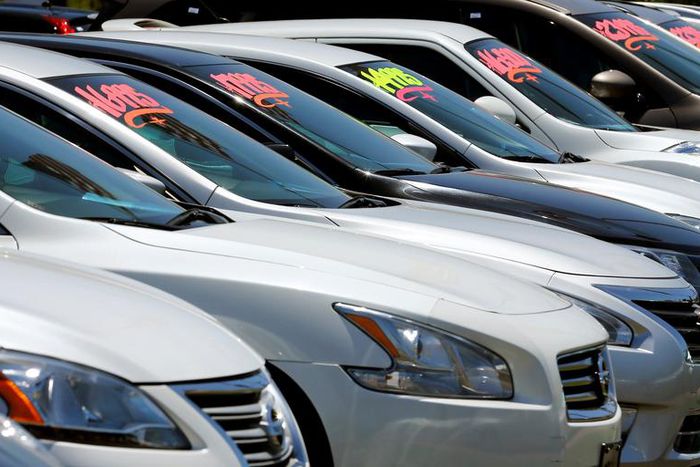 FILE PHOTO: Automobiles are shown for sale at a car dealership in Carlsbad, California