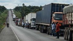 Trucks waiting clearance to enter Uganda from Malaba, at the border with Kenya. PHOTO | FILE