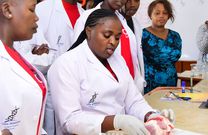 Rose Tata Wekesa, the Kenyan teacher who has broken records by conducting the longest science class ever, lasting for 62 hours, 33 minutes, and 34 seconds.
