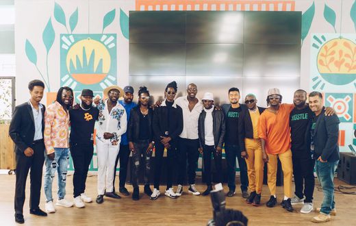 HustleSasa Co-Founders pose for a photo with Creative Co-Founders, Sauti Sol, and other creatives during the company's official launch in Nov 2021 at Nairobi Street Kitchen Photo courtesy KG Brian