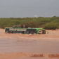 Passengers aboard a Nairobi-bound bus had their journey cut short after the vehicle was submerged in flood waters in Tula area along the Garissa- Mwingi road on Tuesday morning.