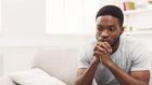 Black man thinking [iStock]