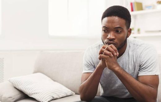 Black man thinking [iStock]