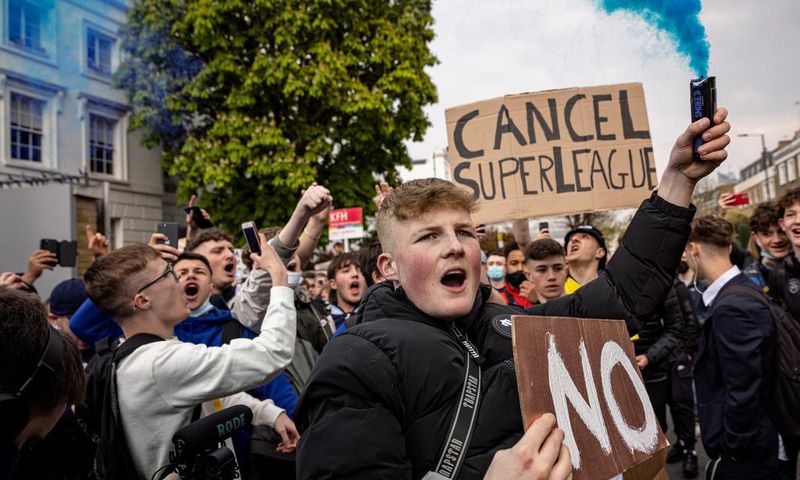 Soccer fans protest plans for a European Super League.