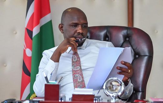 Transport Cabinet Secretary Kipchumba Murkomen reads the NTSA accident statistics in his office on December 19, 2022