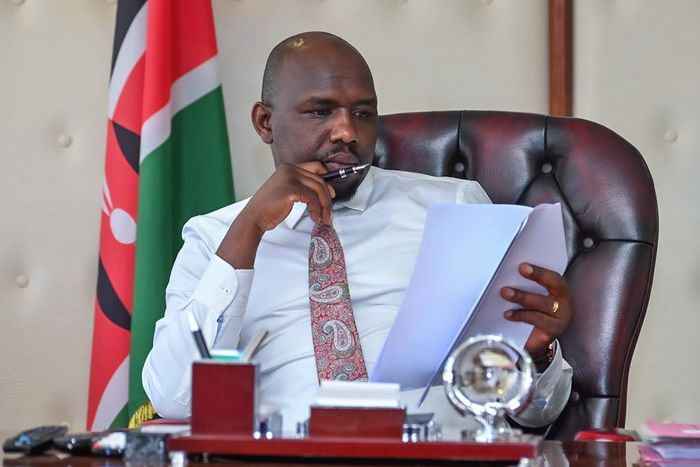 Transport Cabinet Secretary Kipchumba Murkomen reads the NTSA accident statistics in his office on December 19, 2022