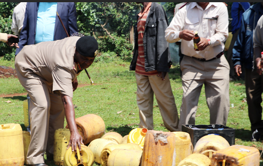 Security officers pour illicit brews during crackdown in Kirinyaga