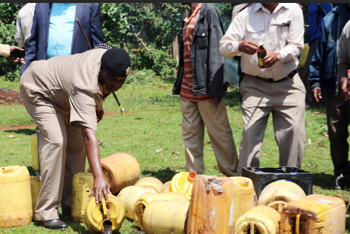 Security officers pour illicit brews during crackdown in Kirinyaga