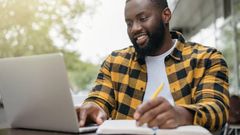 A man engaged in an online activity Photo Credits - Mirel Kipioro