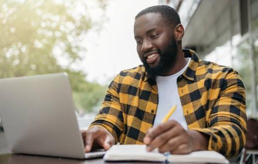 A man engaged in an online activity Photo Credits - Mirel Kipioro
