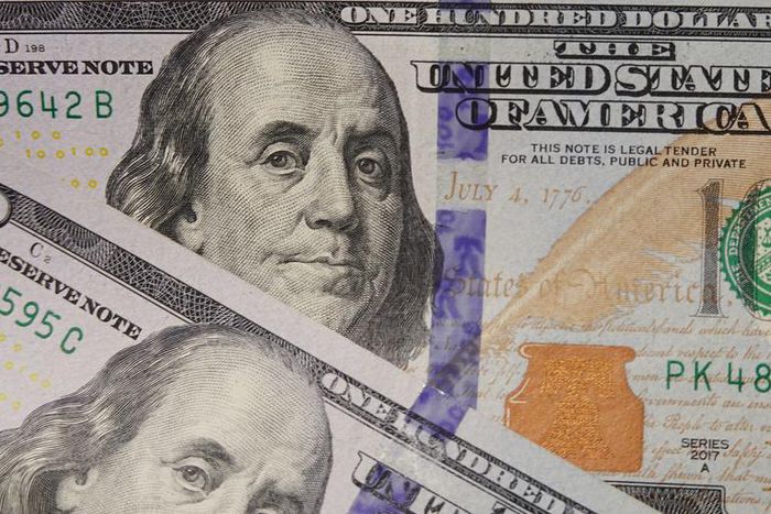 100 dollar bills seen displayed.(Photo Illustration by Sheldon Cooper/SOPA Images/LightRocket via Getty Images)