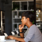 A Black woman with her laptop [Go Banking Rates]