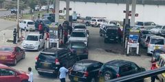 Motorists queueing for fuel at a petrol station
