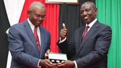 Central Bank Governor Kamau Thugge and President William Ruto during the launch of the DhowCSD on Tuesday, September 11, 2023