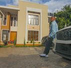 Jaguar outside his residence
