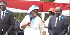 IEBC Chair Wafula Chebukati (right), his wife Mary and son Emmanuel