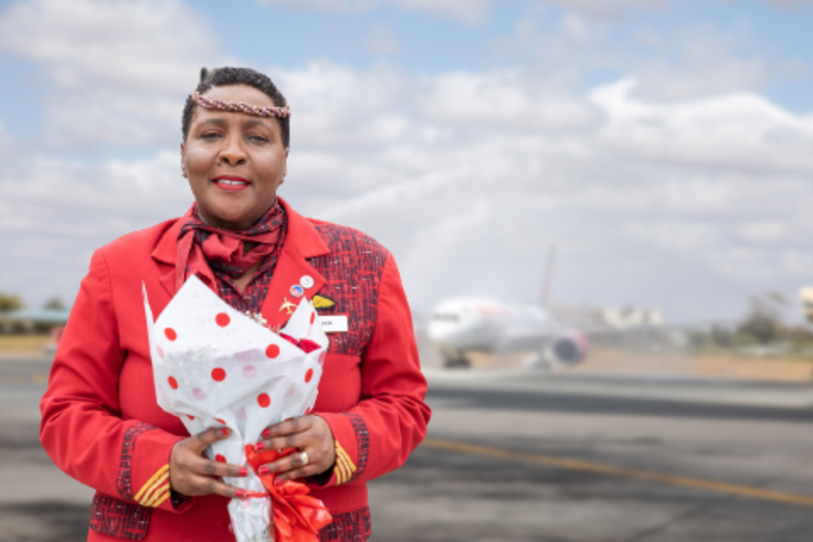 Long-serving KQ staffer Alice Waweru receives unforgettable water cannon salute