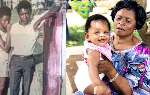 Proscovia Musoke and her husband, Gerald Mayanja Musoke posing for a picture with a grandchild