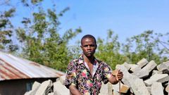 Crazy Kennar constructing church in his village