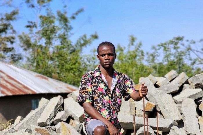 Crazy Kennar constructing church in his village