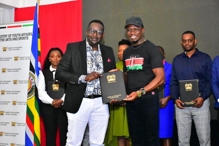 Sports and Youth Affairs Cabinet Secretary, Ababu Namwamba with comedian Daniel Churchill Ndambuki at Kasarani stadium on February 15, 2023