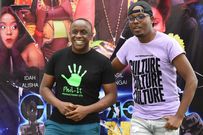 Abel Mutua and Phil Director