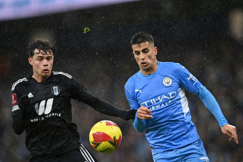 Manchester City defender Joao Cancelo (right)