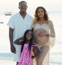 Minne Kariuki, her husband and daughter