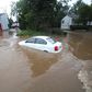 A car stuck in floods