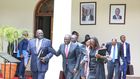 President William Ruto shares a light moment with former CS George Magoha