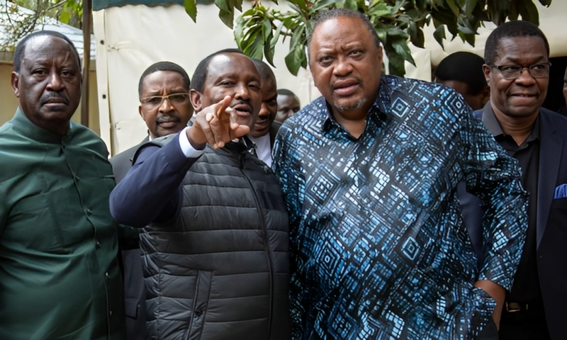 Former Prime Minister Raila Odinga greeting Former President Uhuru Kenyatta at the Stephen Kalonzo Command Centre in Karen on July 28 2023.