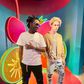 Singer Bahati posing next to the wax statue of pop singer Justin Bieber at Madame Tussauds Museum, Singapore