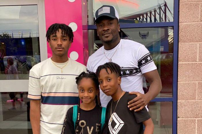 Asamoah Gyan and his three children