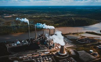 Smoke pipes of factory in a city [Image: Kelly]