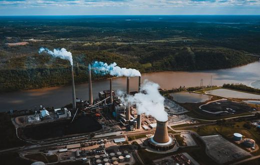 Smoke pipes of factory in a city [Image: Kelly]