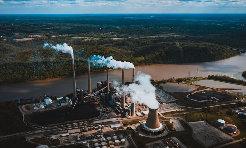 Smoke pipes of factory in a city [Image: Kelly]