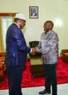 Miguna Miguna with President William Ruto at the Kisumu State Lodge on January 14, 2023