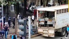 A Nairobi County lorry with smokey trolleys