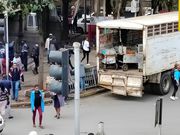 A Nairobi County lorry with smokey trolleys