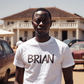 AI-generated image of a man wearing a white T-shirt with a writing Brian  on it