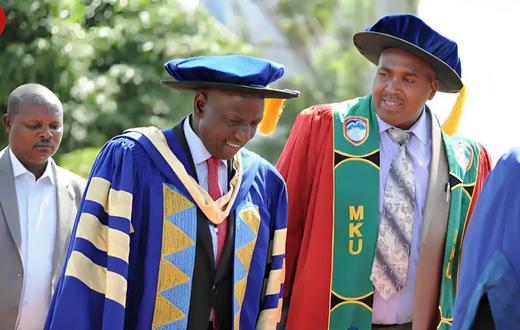 President William Ruto and Prof Simon Gicharu