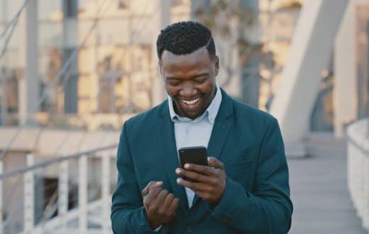 Blackman excited looking at the phone