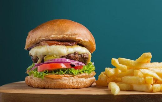 Photo of beef cheeseburger with a side of fries [Image Credit: Daniel Reche]