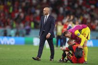 Former Belgium head coach Roberto Martinez, Belgium's Toby Alderweireld  and goalkeeper Simon Mignolet look dejected after a draw result 0-0 meaning the elimination in the group phase on December 1, 2022.
