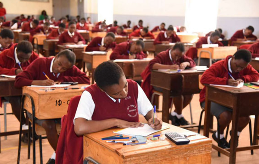 Learners writing KCSE exams