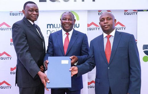 Dr James Mwangi, Equity Group Managing Director and CEO (centre), William Rahedi, Spire Bank Board Chairman (right) and Joel Gachari, Mwalimu National Sacco National Chairman (right) during the partnership signing ceremony