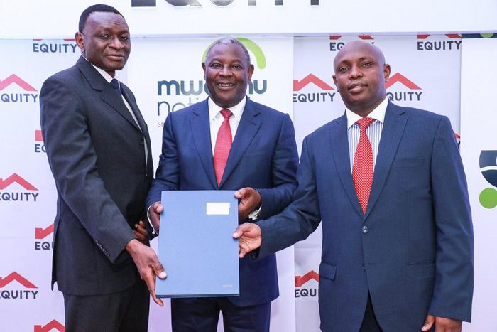 Dr James Mwangi, Equity Group Managing Director and CEO (centre), William Rahedi, Spire Bank Board Chairman (right) and Joel Gachari, Mwalimu National Sacco National Chairman (right) during the partnership signing ceremony
